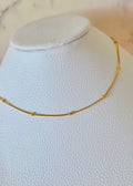 Collar liso con balines intercalados