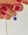 collar ojito azul
