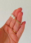 Pulsera de tres perlas con agarre brillante ajustable