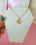 Collar fe en marco redondo de zirconias
