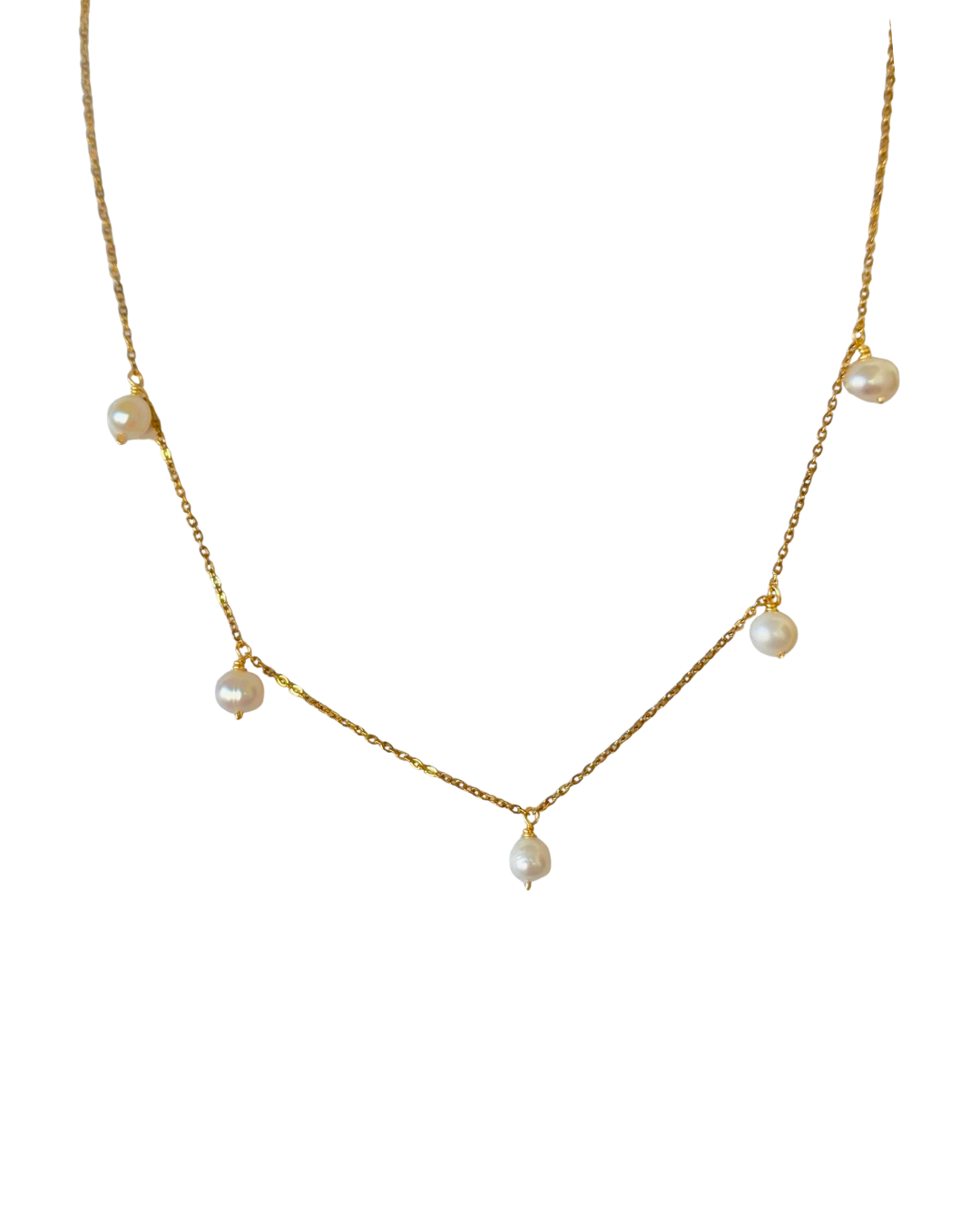 collar con  perlas colgantes