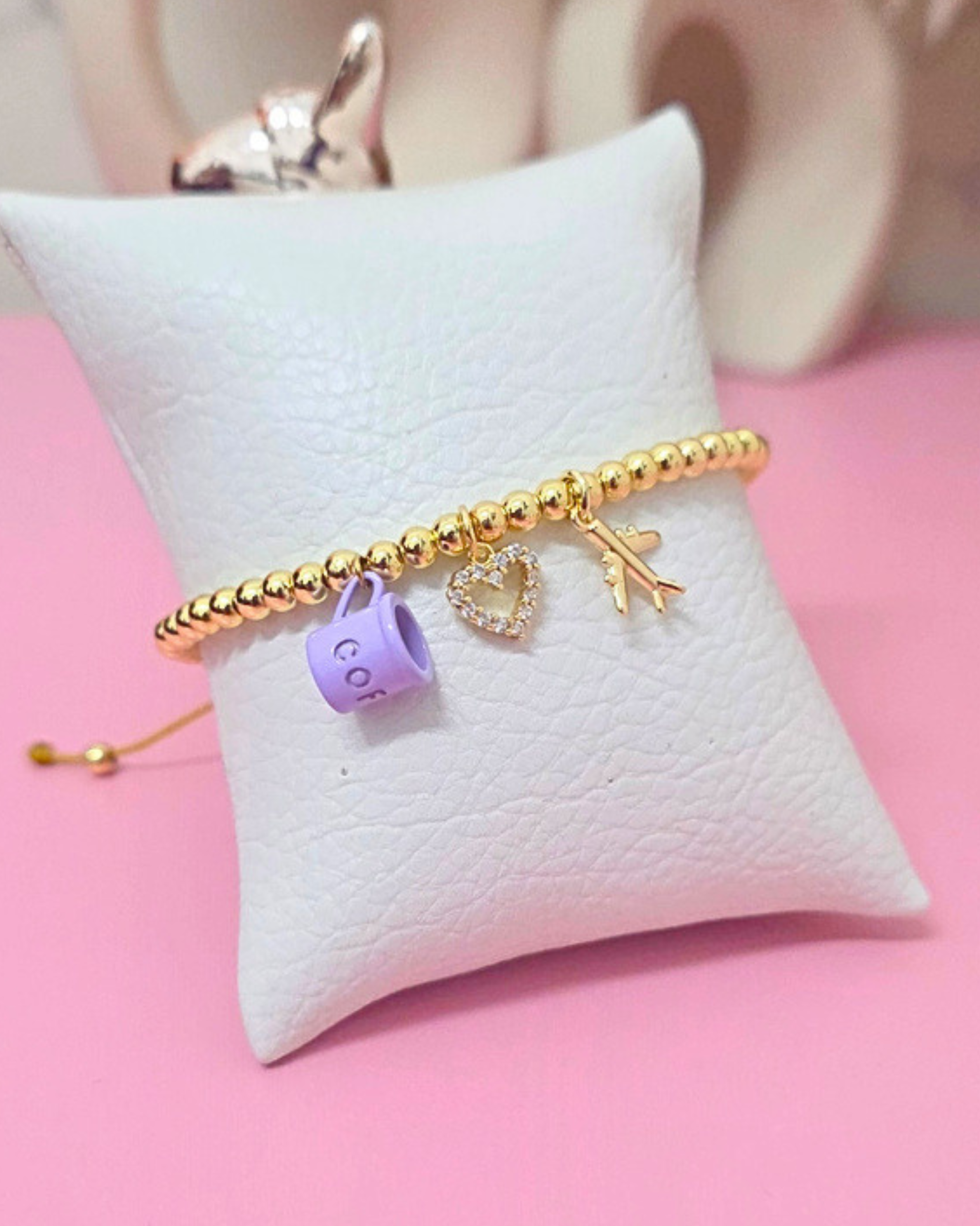 Pulsera ajustable de taza morada, corazón y avión