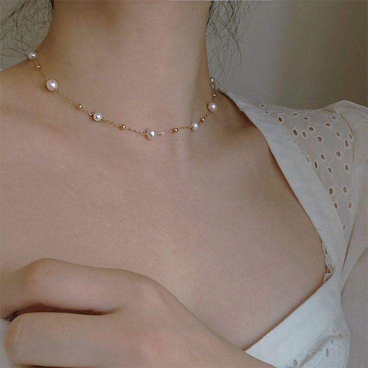 collar de perlas y balines