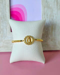 Pulsera virgen de Guadalupe en marco tipo flor