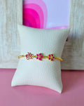 Pulsera de tres flores rosa
