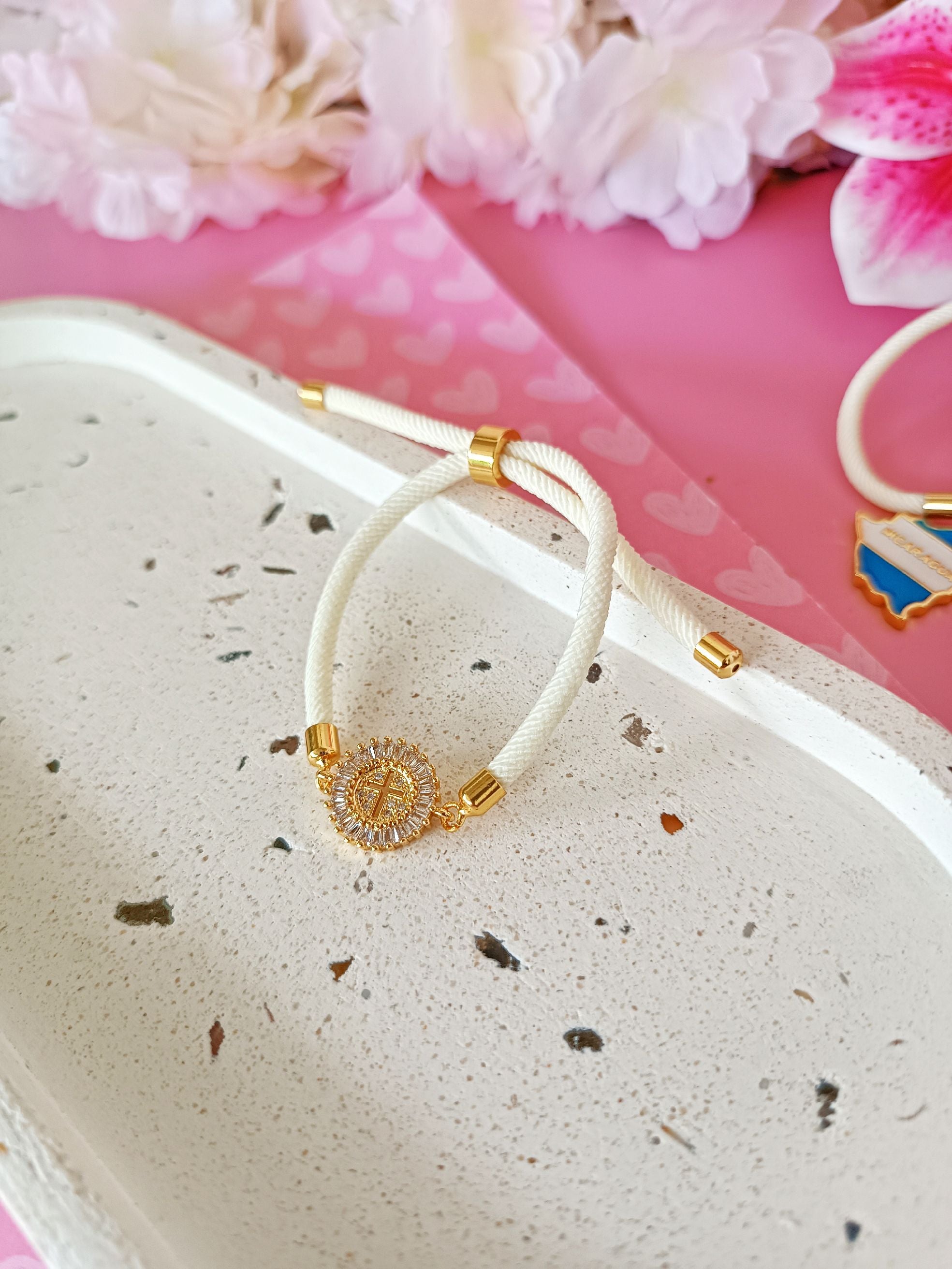 Pulsera cruz tipo sol mini