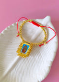 Pulsera escapulario con tejido de mostacilla