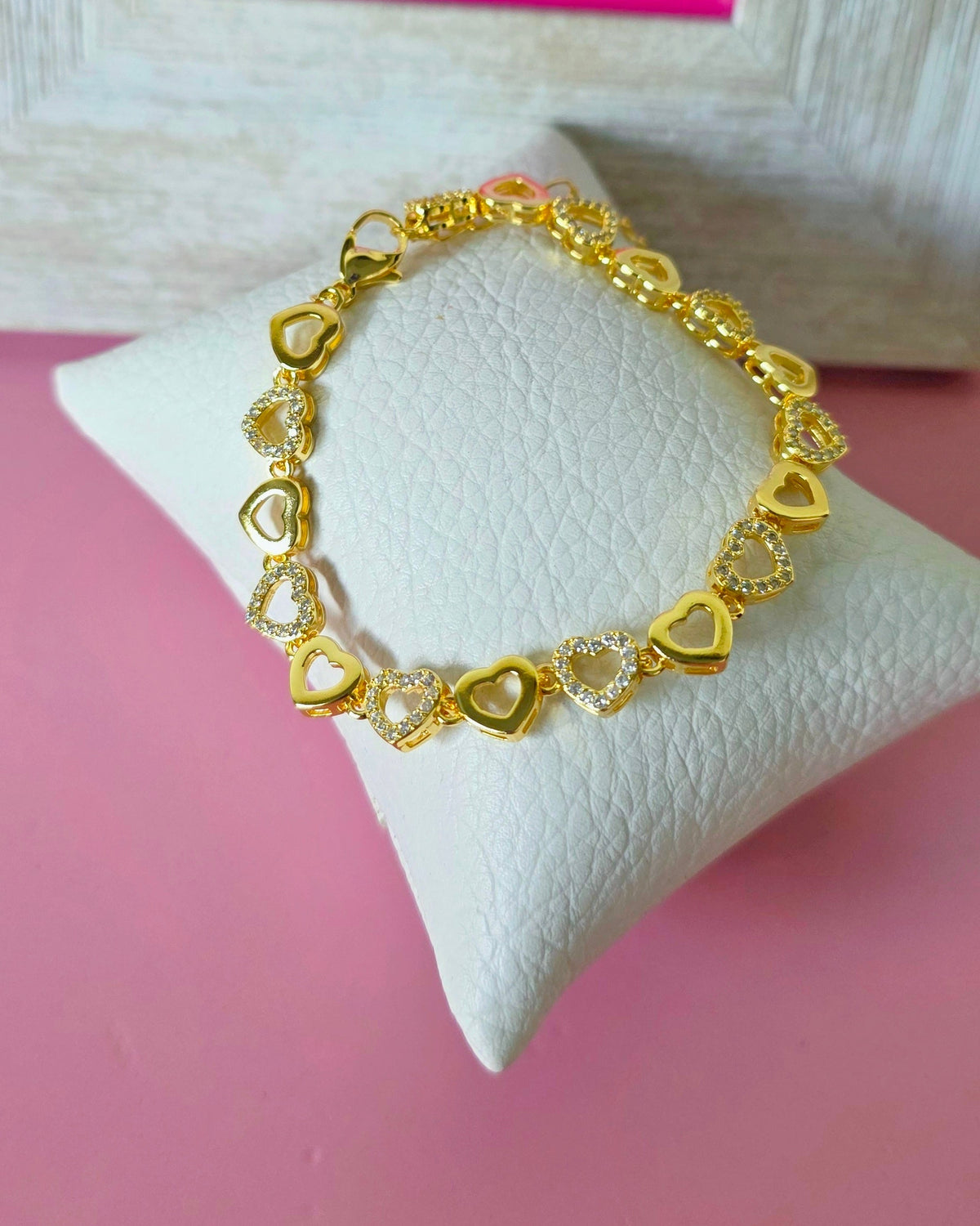 Pulsera corazones silueta