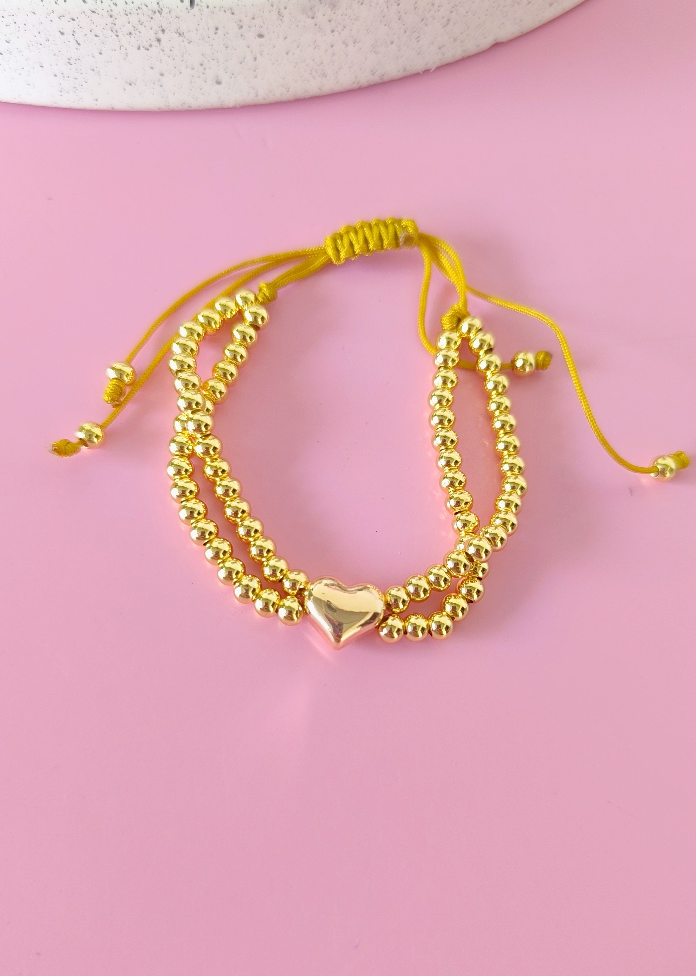 Pulsera ajustable doble cuerda con centro corazón