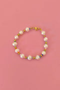 Pulsera perlas del rio con chaquiras de colores y balines de acero