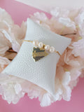 Pulsera ajustable de perlas y dijes Nicaragua variados