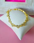 Pulsera corazones brillantes