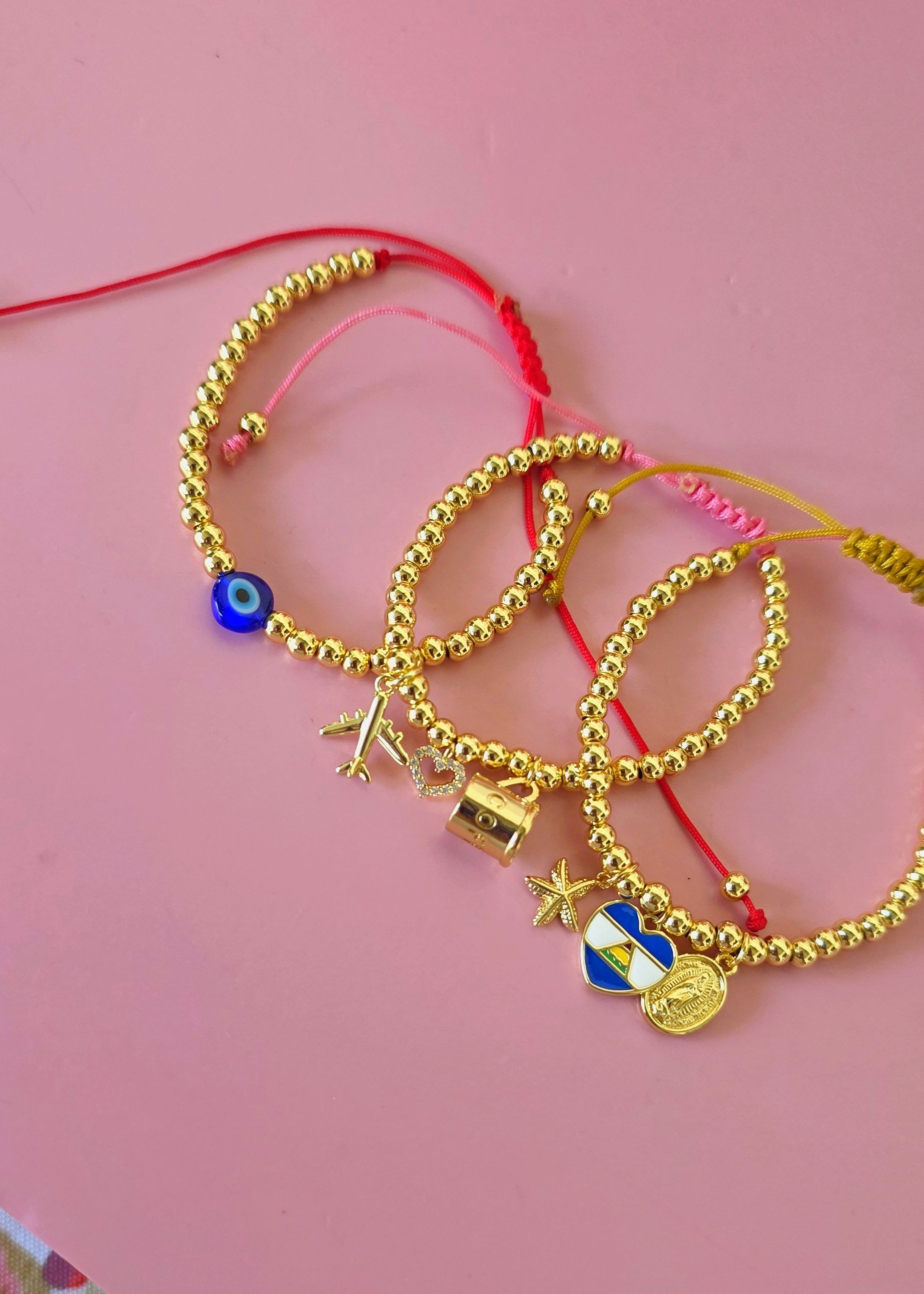 Pulsera ajustable de ojito individual
