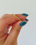 Anillo fila de mini zirconias