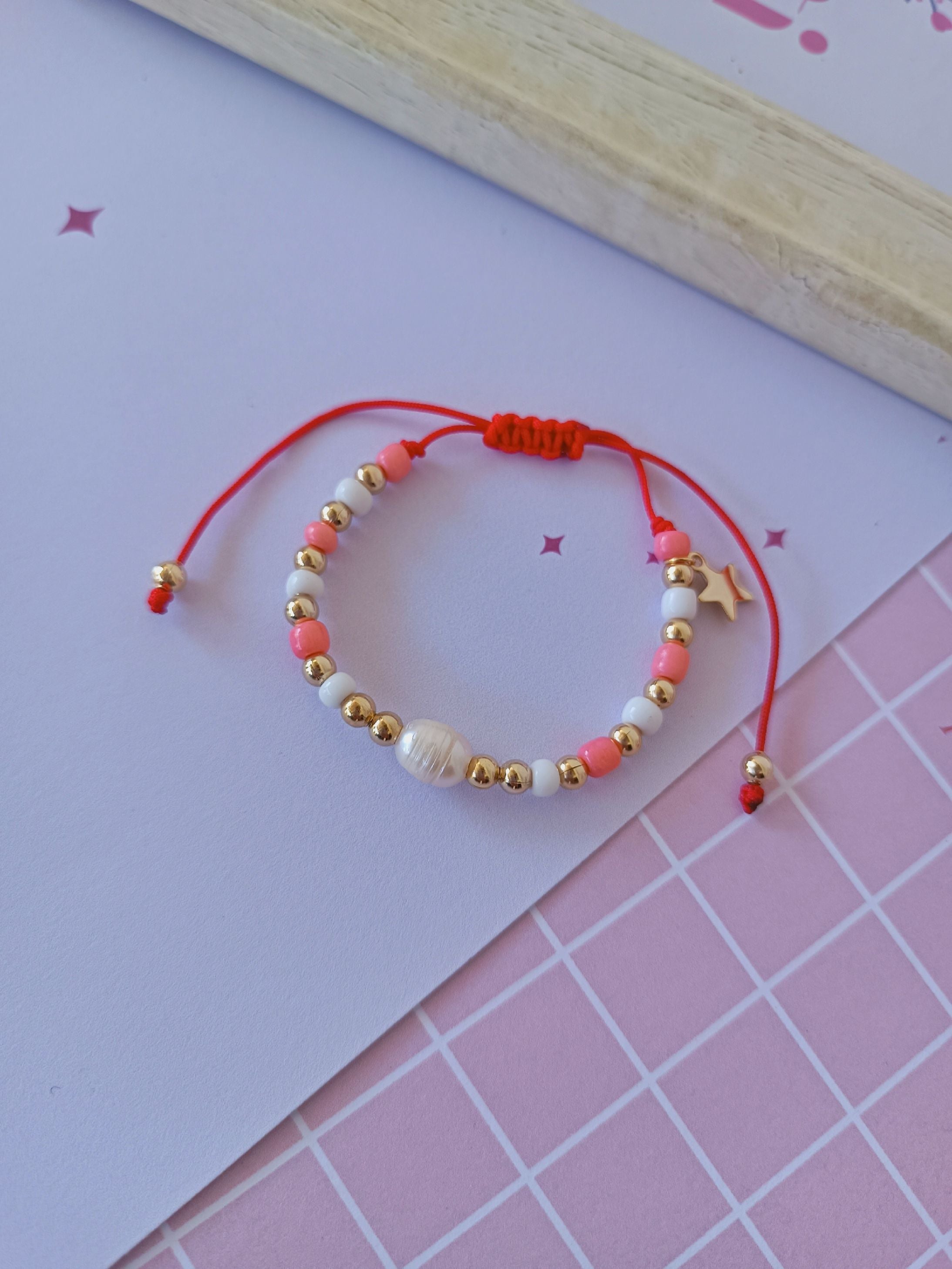 Pulsera mostacillas rosa y blanca con perla y estrellita