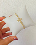 Pulsera cruz brillante silueta