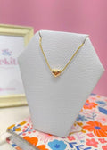 corazón mediano con volumen y collar liso de acero
