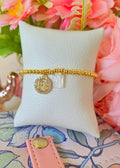 Pulsera ajustable de escapulario concha nacar y dije fe