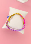 Pulsera ajustable balines morado y rosa