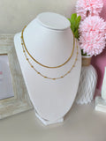 Set doble de cadena lisa serpiente y collar bolita